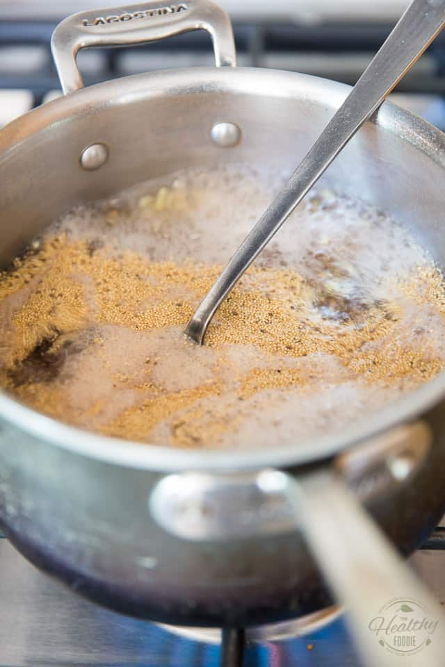 Brining the grains and water back to the boil, stirring with a large spoon