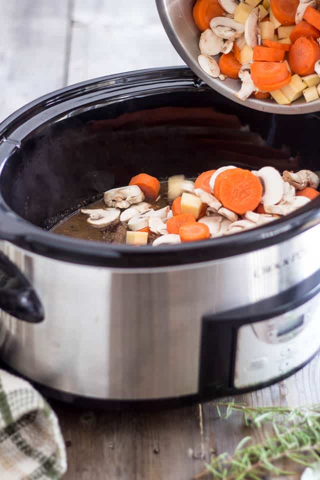 Squeaky Clean Slow Cooker Beef Bourguignon | thehealthyfoodie.com