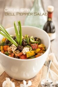 This Greek Style Bell Pepper Salad is incredibly simple, super quick to make and bursting with flavor. The perfect accompaniment to your favorite grilled meat!
