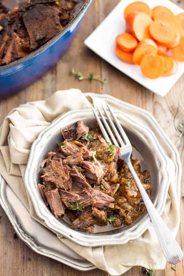 Slowly braised in a Dutch oven, this soul warming dish could very well be referred to as fall apart tender beef meet French onion soup...