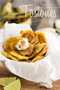 Tostones or Fried Green Plantain are such a crunchy, tasty source of carbs and so easy to make, you'll want to have them all the time!