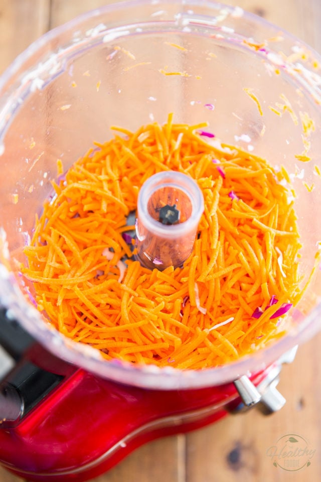 Grate the carrots, with a box grater or food processor