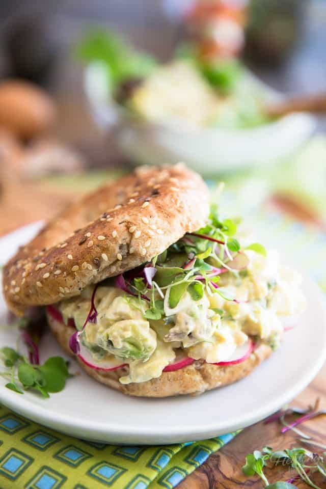 Hard boiled eggs and avocados are brilliantly brought together by yogurt and sour cream in this easy and delicious Avocado Egg Salad. Enjoy it as is or turn it into a nutritious sandwich!