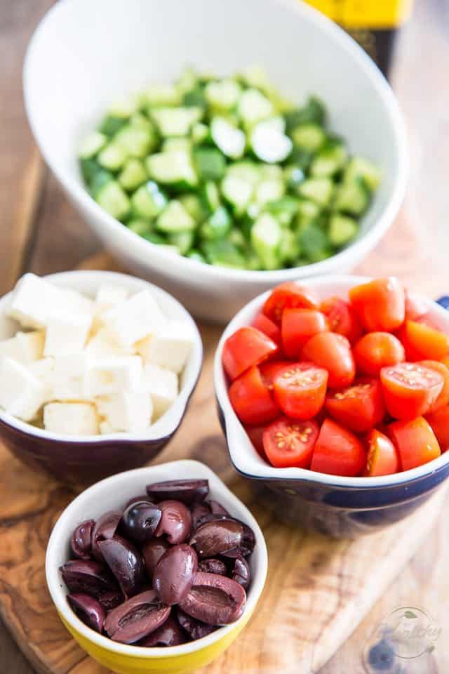  This instant Greek Style Tomato Cucumber Salad takes only minutes to put together and has flavor to last 'til tomorrow! Get it on your plate today! 