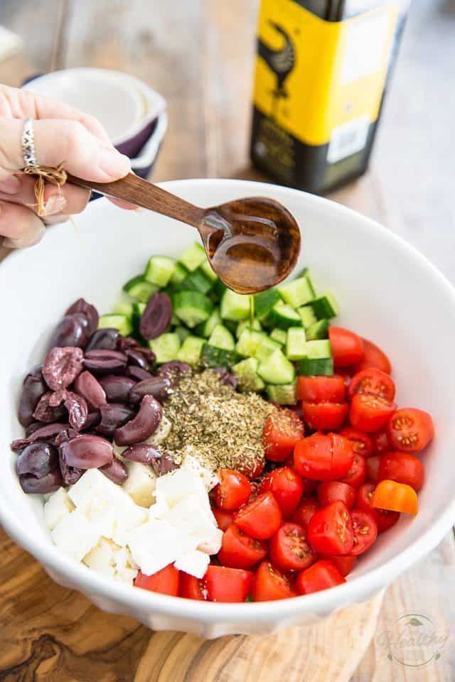  This instant Greek Style Tomato Cucumber Salad takes only minutes to put together and has flavor to last 'til tomorrow! Get it on your plate today! 