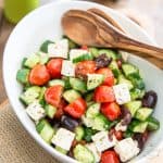 This instant Greek Style Tomato Cucumber Salad takes only minutes to put together and has flavor to last 'til tomorrow! Get it on your plate today!