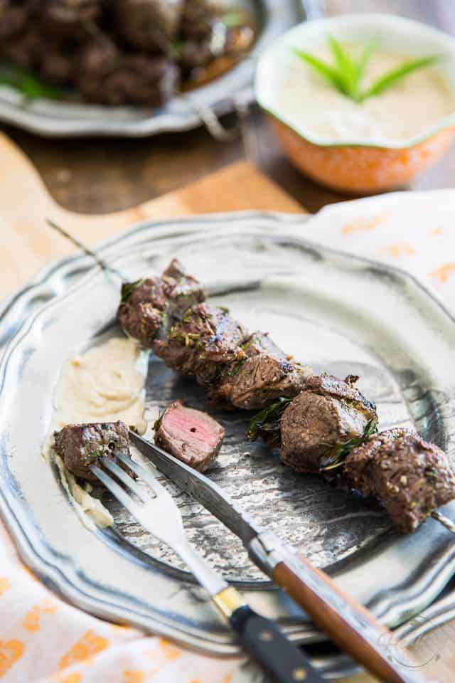 These lamb kabobs and tahini sauce harbor so much flavor, they totally belong on the menu of a 5 star restaurant! Learn how to make them super easily in the comfort of your own home. 