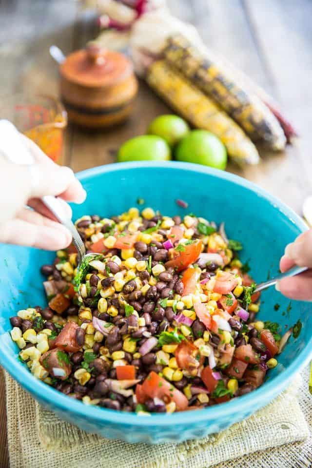 Bring on the maracas! This black bean and corn salad tastes just like a Mexican Fiesta is happening right inside your mouth! 