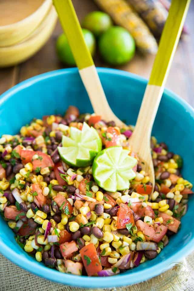 Bring on the maracas! This black bean and corn salad tastes just like a Mexican Fiesta is happening right inside your mouth! 