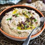 Quick to make and better than store-bought, this Olive Hummus will have you fall in love with the delicious chickpea spread all over again!