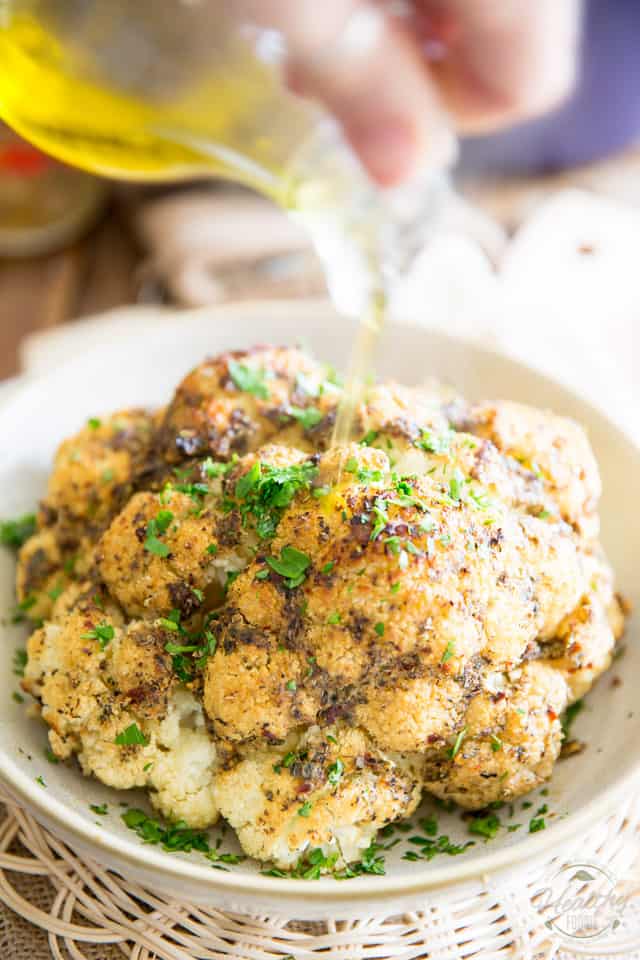 Oven Baked Whole Roasted Cauliflower is the easiest and tastiest way to prepare cauliflower. It'll make you an instant fan, guaranteed!