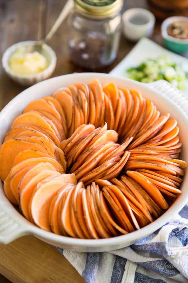 This elegant Scalloped Sweet Potato Ring is much easier to make than you may think and is so incredibly good, it's the perfect sweet potato recipe for any occasion! 
