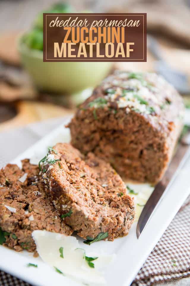 Grated zucchini, cheese and sun dried tomatoes make this Cheddar Parmesan Zucchini Meatloaf so moist and tasty, it will easily become a family favorite! 