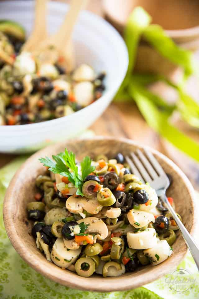 Love olives? Then you will be absolutely all over this Loaded Olive Salad. So quick and easy to make, too! Open cans, chop a few veggies, mix and enjoy!