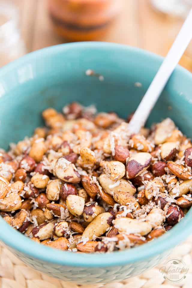 Nuts, coconut and spices in a blue bowl