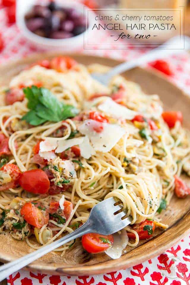 Exploding with so much flavor but ready in mere minutes, this simple yet sophisticated Clams and Cherry Tomatoes Angel Hair Pasta dish is the perfect choice for your next quick and casual romantic dinner for two...