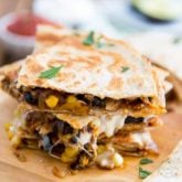 Super quick and easy to make, these healthier Chicken Quesadillas are loaded with chicken, corn, olives and just what it takes of cheese to bind it all together. With their explosion of Mexican flavors, kids and adults alike will love 'em!