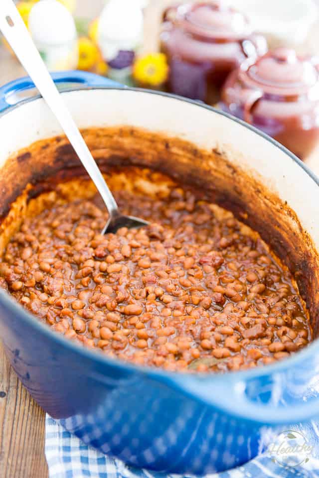 Old Fashioned Baked Beans in a blue Dutch oven, ready to serve