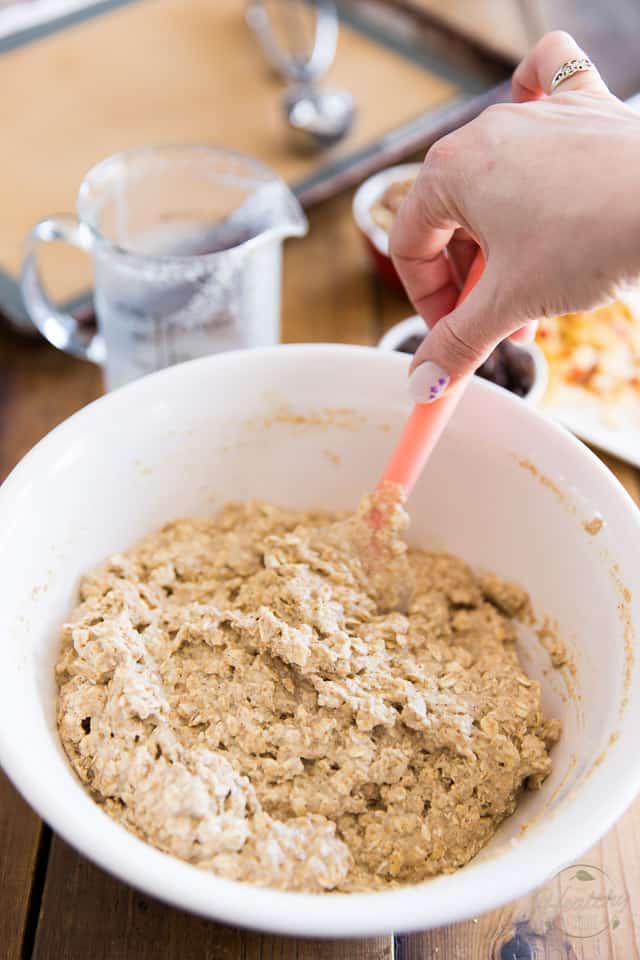 Oatmeal Cookie Dough getting mixed with a rubber spatula