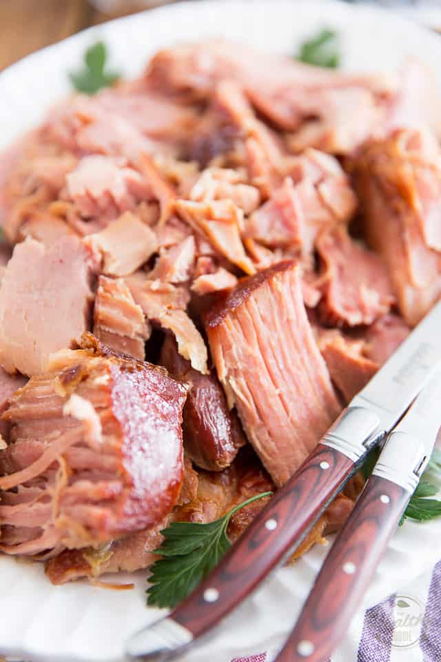 Cooked for hours in a succulent brew of pure maple syrup and all natural pale ale, this Slow Cooker Maple and Beer Smoked Ham will, without a doubt, come to be the most tender, tastiest and juiciest ham you'll have ever tasted! 