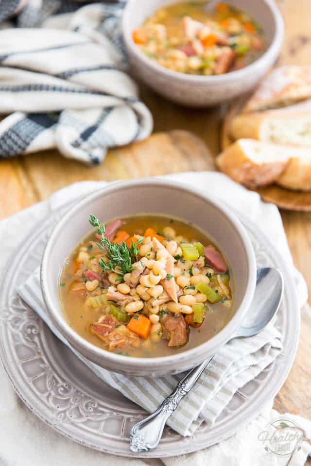 With its generous chunks of carrots, celery, loads of navy beans and cubed ham, this White Bean and Smoked Ham Soup is as hearty and nutritious as can be! The perfect way to warm you up on a chilly day, or to use up your leftover ham!
