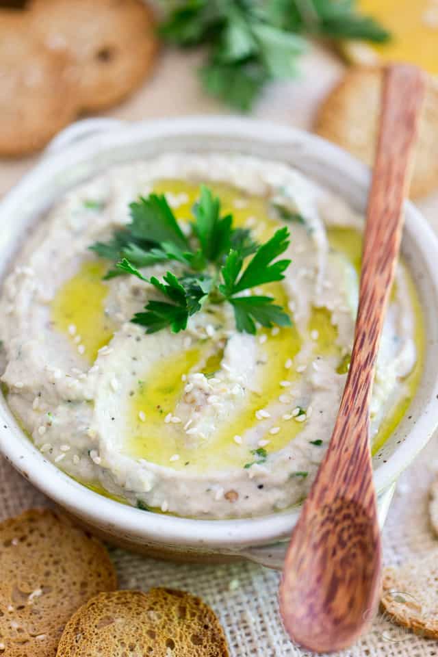 Baba Ghanouj is a creamy eggplant dip that's not only super delicious but also crazy good for you! Finally a dip you can enjoy absolutely guilt free! Try it with veggies, pita bread or your favorite crackers!