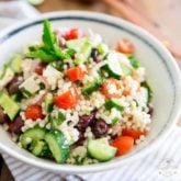 Loaded with tomatoes, cucumbers, feta cheese and kalamata olives, this Greek Style Pearl Couscous Salad is super refreshing, bursting with flavor and sure is a nice twist on your traditional Greek Salad! Bound to become a favorite this summer...