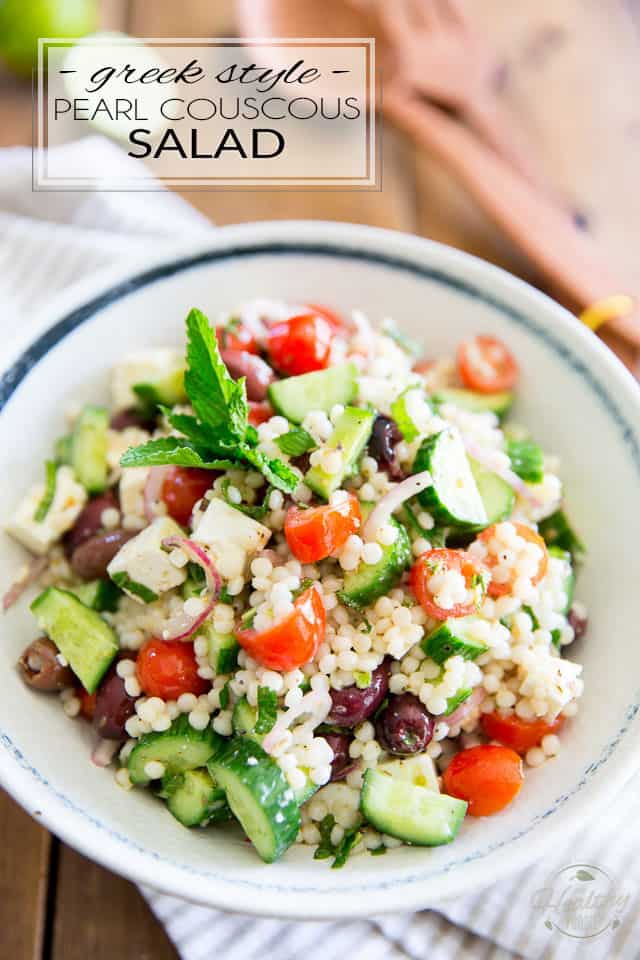 Loaded with tomatoes, cucumbers, feta cheese and kalamata olives, this Greek Style Pearl Couscous Salad is super refreshing, bursting with flavor and sure is a nice twist on your traditional Greek Salad! Bound to become a favorite this summer... 