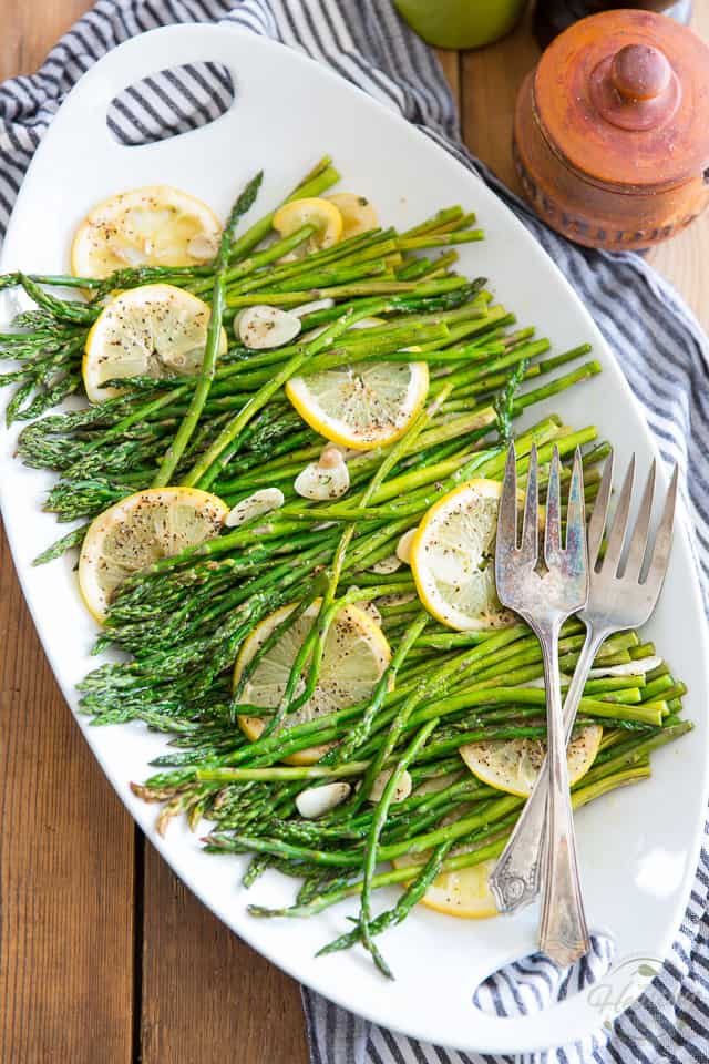 Making these Lemon Garlic Oven Roasted Asparagus is probably the easiest, simplest but most delicious way to cook asparagus. It requires close to no effort on your part... the oven does all the work for you! 