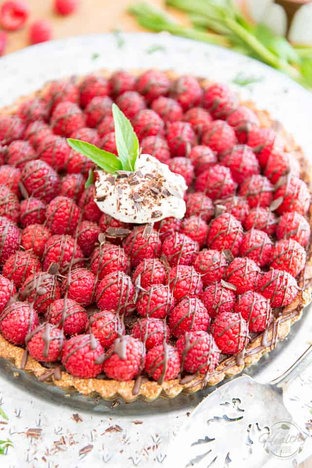 Not only is it free of gluten or refined sugar, this Raspberry Chocolate Pie also happens to be made with a whole bunch of natural, good for you ingredients! The perfect refreshing guilt-free desert of the summer!