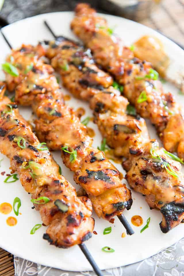 These Honey Dijon Chicken Skewers are crazy tender and juicy, super tasty with a little bit of a kick... and they're very easy to make, too! Why not throw them on the grill today?