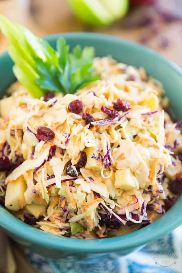 Super quick and easy to make, this Crazy Good Creamy Coleslaw will no doubt become a new favorite of yours! Indeed, the addition of apples and cranberries to this great classic is a total game changer. Just wait 'til you try it! 