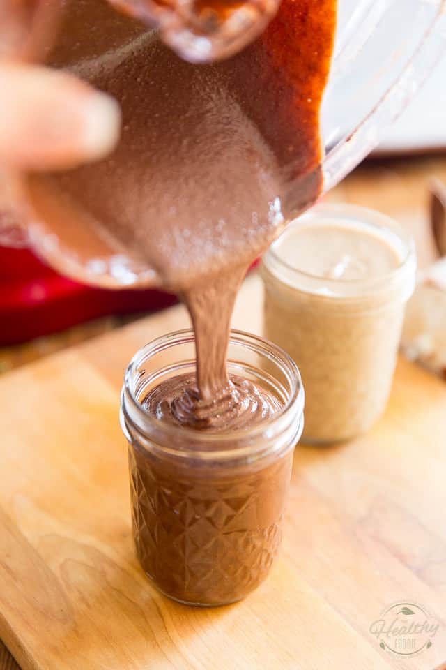 Dark Chocolate Hazelnut butter is being poured into a glass jar