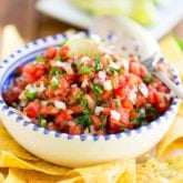Pico de Gallo is a crazy tasty yet super simple Mexican salsa made from chopped tomatoes, onion, cilantro, fresh jalapenos, salt, and lime juice. Serve it with tortillas or sprinkle liberally on all your favorite foods!
