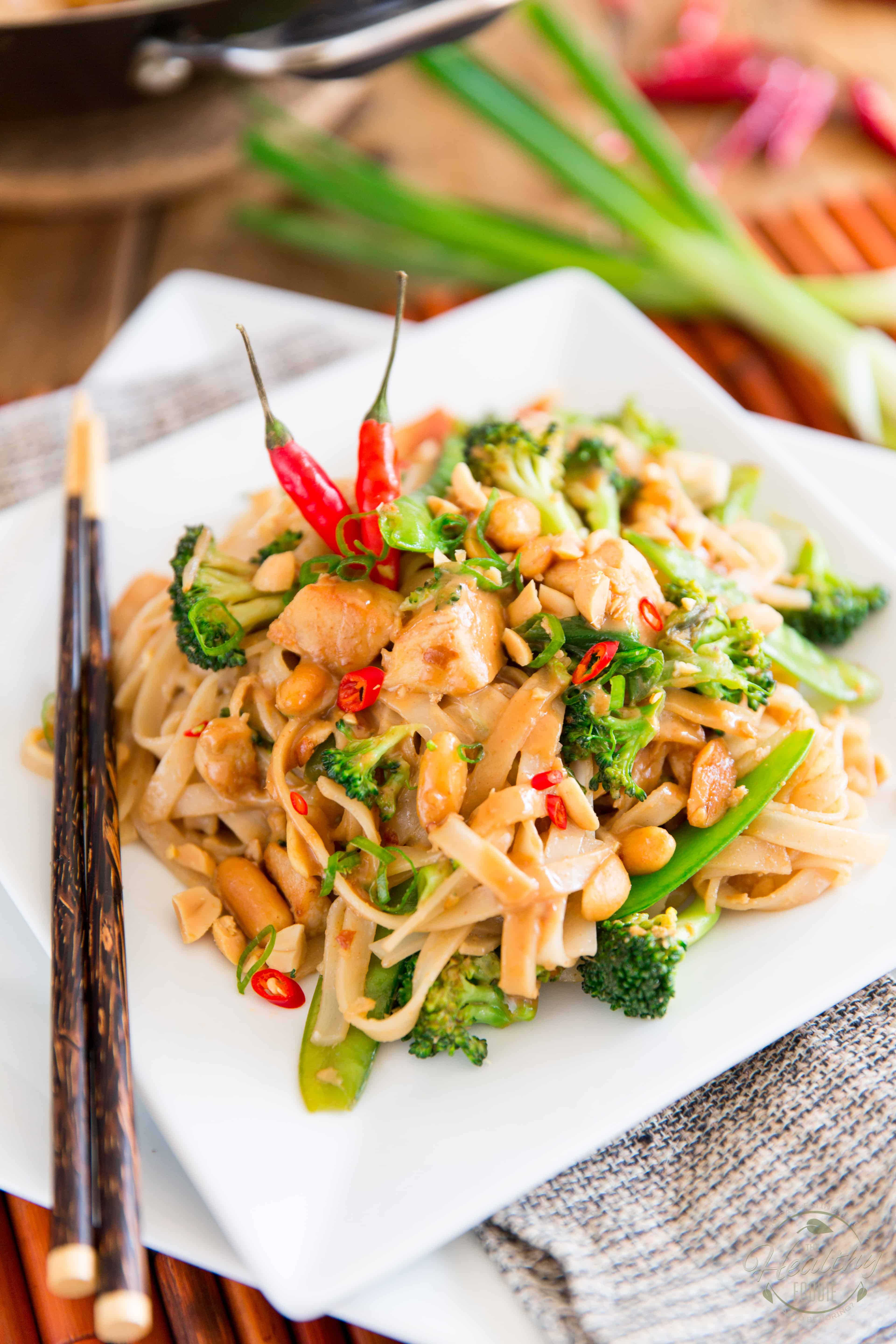 This spicy peanut chicken noodle dish is loaded with tasty morsels of chicken, crunchy veggies and soft rice noodles, all wrapped up in a rich and spicy peanut sauce.  