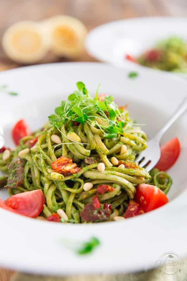 Arugula Pesto is a very decent, super tasty and much more affordable alternative to traditional basil pesto! Served with pasta, paired with sun dried tomatoes and pine nuts, it makes for a truly winning combination. 