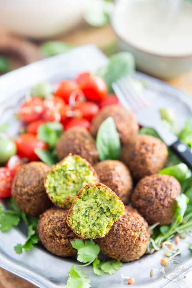 Homemade Falafel is SO much better! Learn how to make this deliciously crispy, light and fluffy chickpea fritter the right way, from scratch, with good wholesome and nutritious ingredients! It's much easier than you think! 