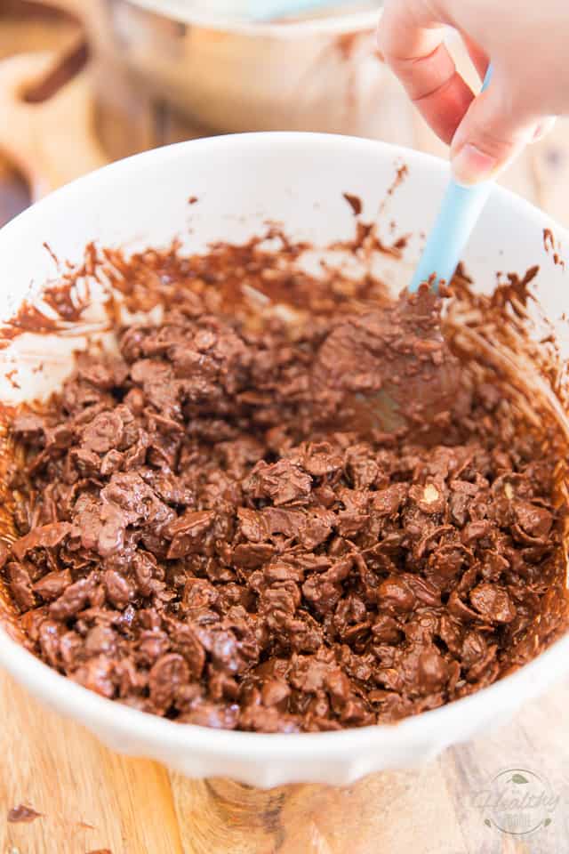 Stirring cereal and chocolate together