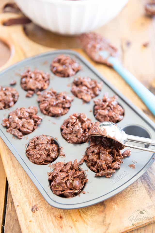 Dropping the chocolate mixture in mini-muffin pans