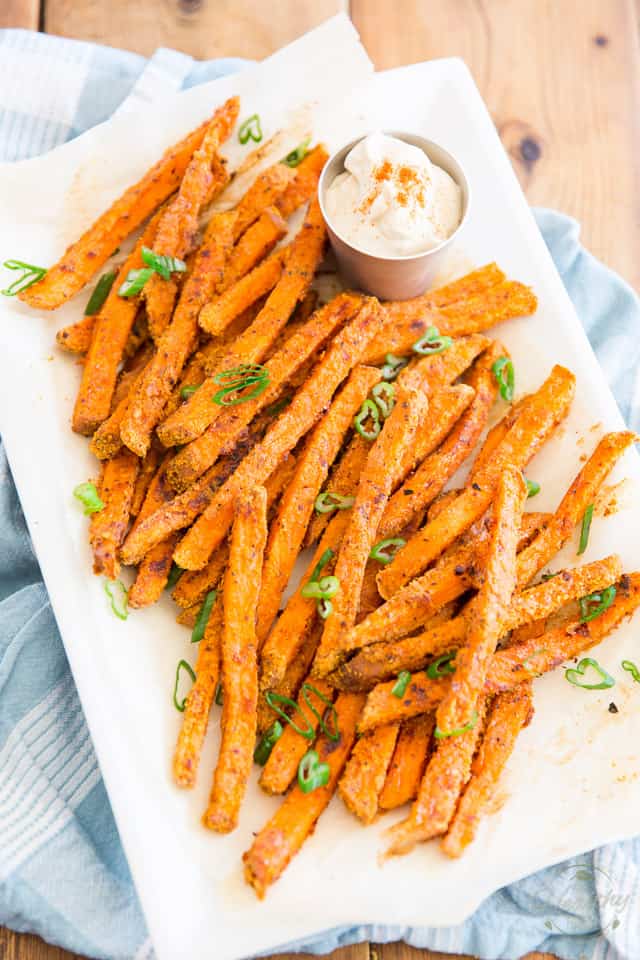 Spicy Oven Baked Sweet Potato Fries that are crispy on the outside, soft on the inside, and all kinds of tasty! Oh, and did I say, all kinds of good for you? Yeah, that too! 
