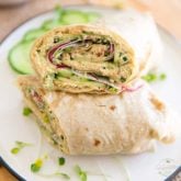 This tasty Vegan Tofu Spread is surprisingly reminiscent of egg salad... Delicious on toasts, in sandwiches, or as part of this nutritious and delectable wrap, with paper thin cucumber and radishes!