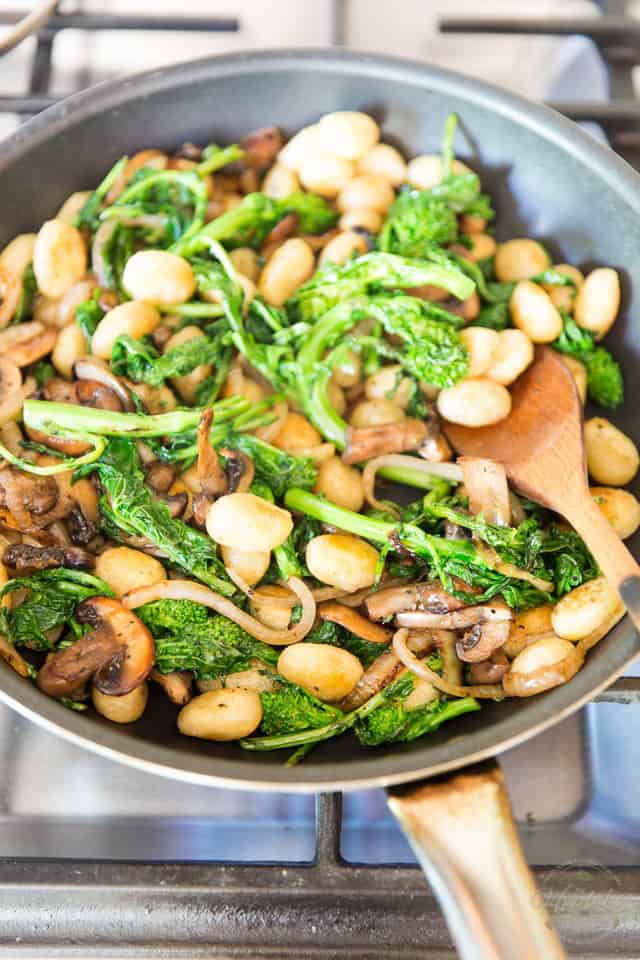 Return the vegetables to the pan and toss to combine