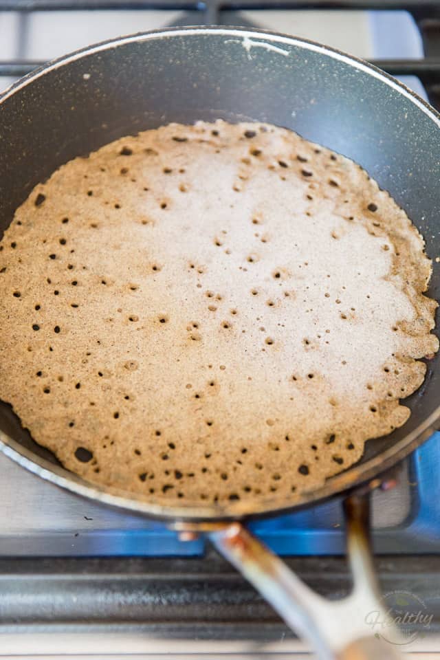 Cook the crepe until the batter is set and the edges start to turn golden