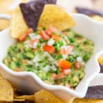 This crazy good Chunky Guacamole is the ultimate healthy and delicious crowd-pleaser dip! Made with nothing but fresh, wholesome ingredients, it's packed with an insane amount of flavor, yet requires only 6 easy-to-find ingredients and 15 minutes of your time to whip up!