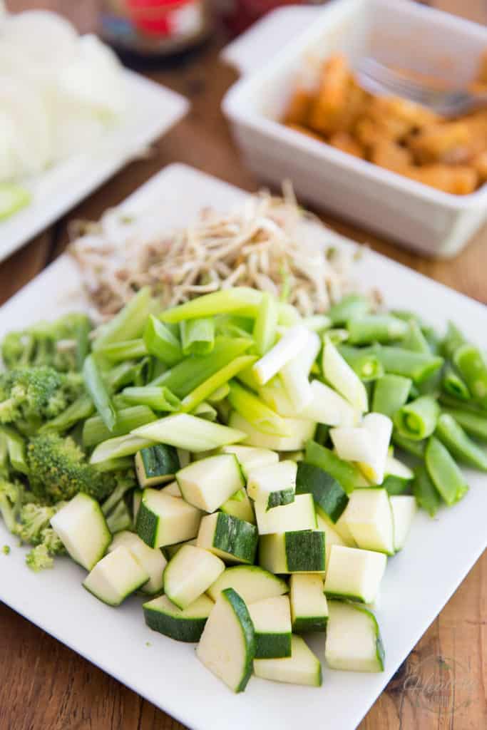 Prep your zucchini, sugar snap peas, bean sprouts, broccoli and green onions