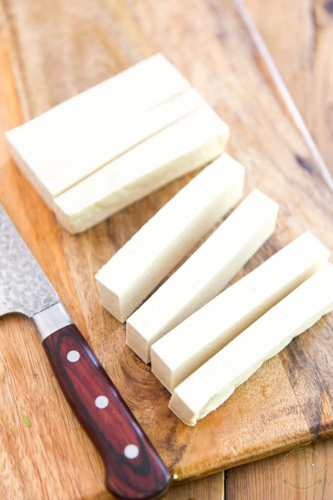 Cut the pressed tofu into 8 strips