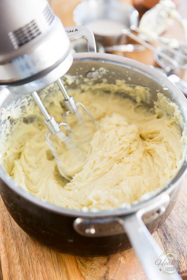 Switch to an electric mixer and whip the potatoes