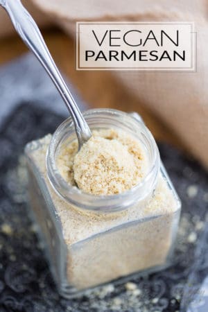 This 5 ingredient Vegan Parmesan only takes 2 minutes to make, and it's so crazy tasty, you'll want to sprinkle it on everything! Think "nooch" to the 10th power!