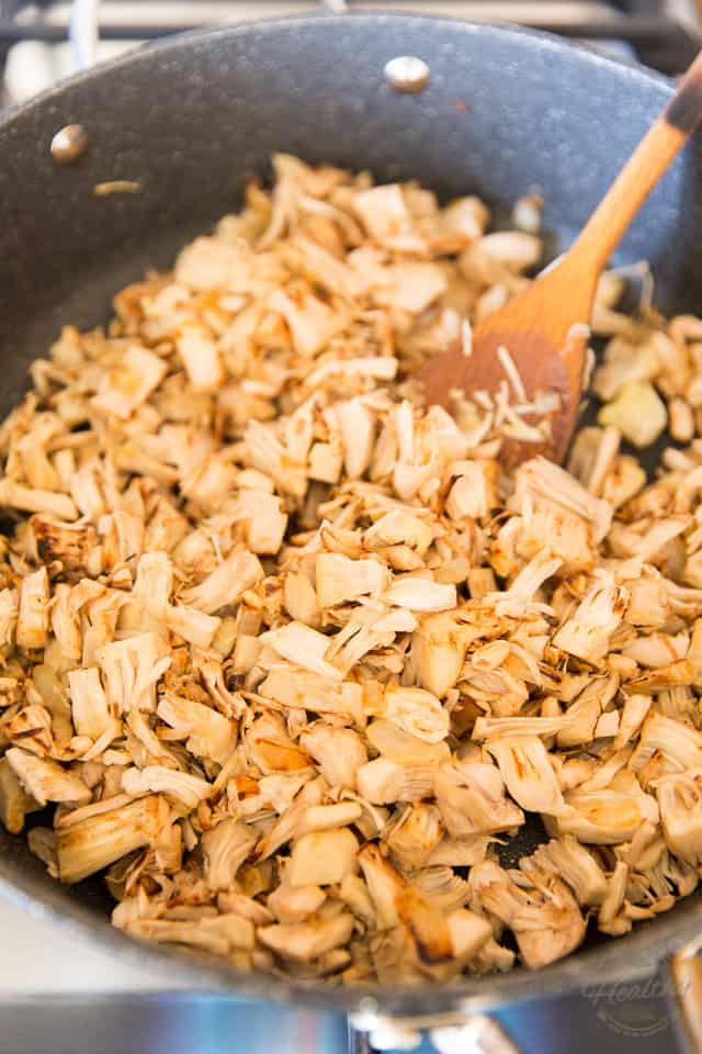 Cook the shredded jackfruit until it's brown and caramelized