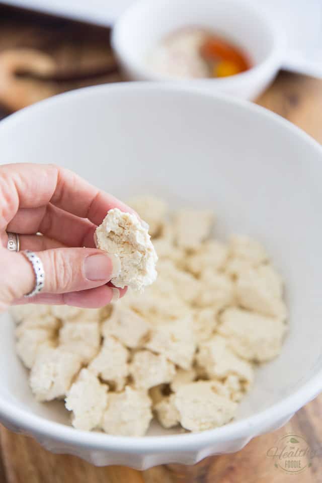 In a large bowl, break the tofu into bite size pieces using your fingers